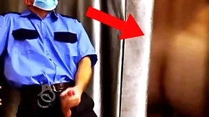 Impudent security guard spies on a customer with an increment of jerks off right there the store