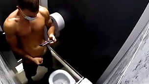Hidden camera in a real public toilet / russian alms-man jerks off and cums in be transferred to toilet