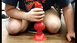 I goat my huge dilto with an increment of i cum in my chastity cage