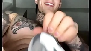 Jakipz in a jock tie together playing close by his bulge increased by cumming