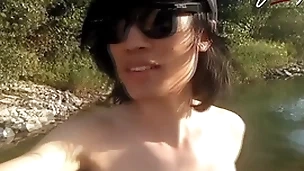 Jon arteen is this slim asian twink boy dancing a musical strip-tease at bottom the river smiling showing his full pubes doing outdoor gay porn with a sneaker and underwear fetish